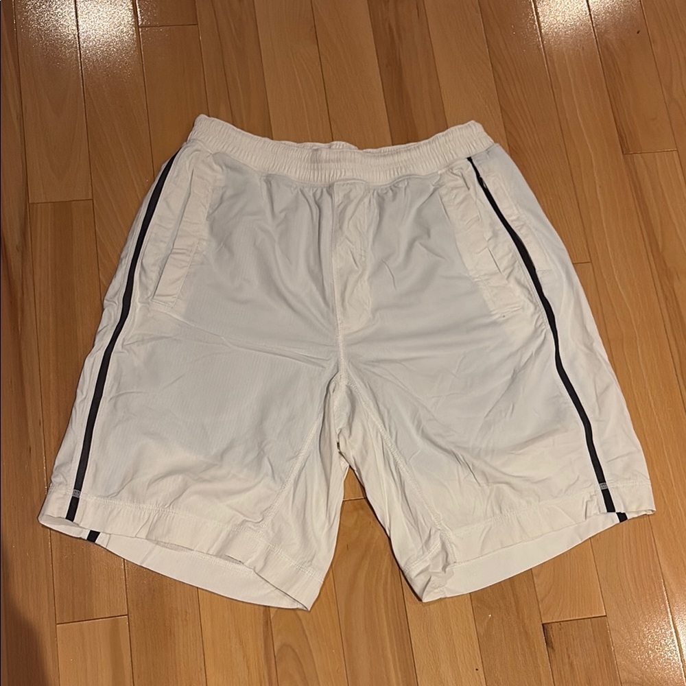 White Men's Lululemon Shorts with Black Stripes - size S